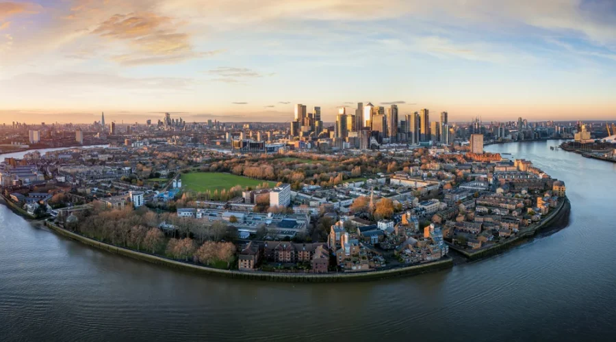 Panoramic-aerial-sunset-view-of-the-Isle-of-Dogs-in-London-with-financial-district-Canary-Wharf-and