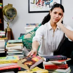 Vick-Hope-poses-for-a-photocall-in-recognition-of-World-Book-Day